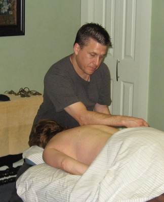 Mark Pukmel doing deep tissue massage